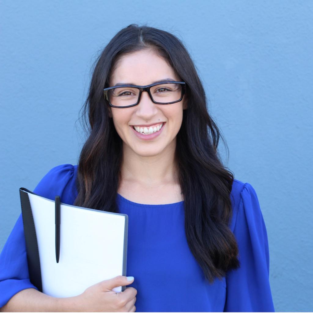 nice-female-student-smiling-looking-at-camera-picture-id636679216-2